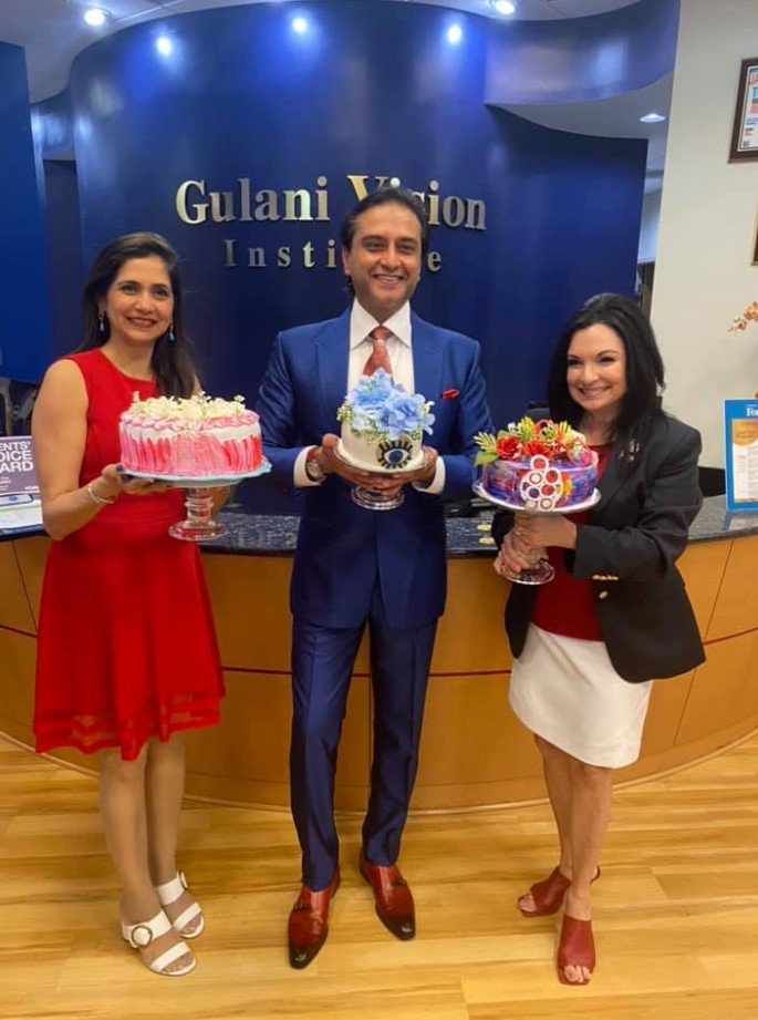 Dr. Suparna Gulani, Dr. Arun Gulani and Donna Guzzo, president and executive director of the Cultural Center at Ponte Vedra Beach, hold up cakes purchased for the ‘Bespoke on the Boulevard’ event.